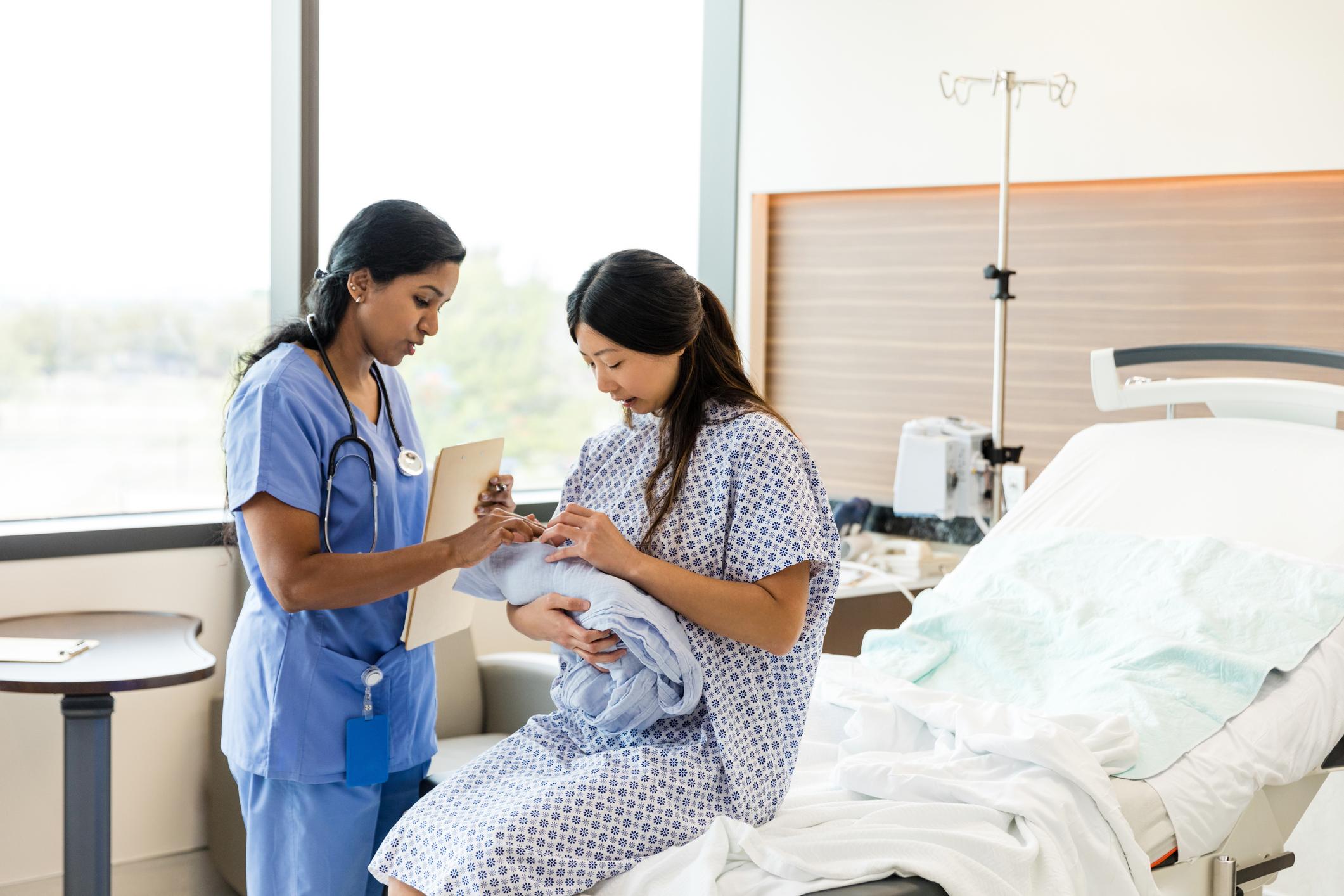 Nurse helping patient